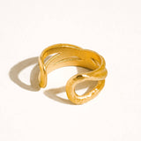 Maison Ella Elowen crossover ring in polished 18k gold plated stainless steel with a textured interwoven design