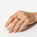 Maison Ella Elowen Crossover Ring in polished 18k gold plated stainless steel worn on a hand