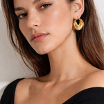 Gold swirl hoop earrings, alternate view