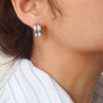 Double C-hoop earrings crafted from premium stainless steel, featuring a bold yet refined silhouette with a 0.6-inch diameter. Hypoallergenic, water- and tarnish-resistant—perfect for adding modern, versatile edge to any everyday look.
