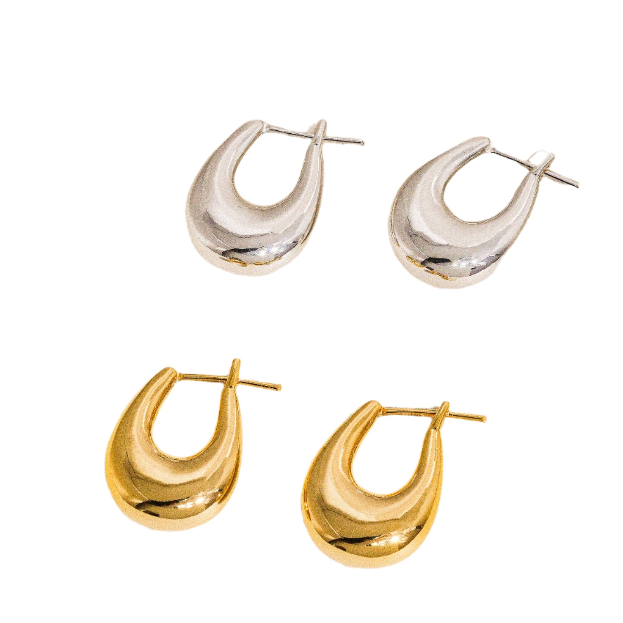 Gold droplet hoop earrings with a gently curved silhouette and smooth, polished finish. Crafted from 18K gold-plated brass, measuring 1 x 0.7 inches. Hypoallergenic, water- and tarnish-resistant—ideal for effortless everyday elegance.