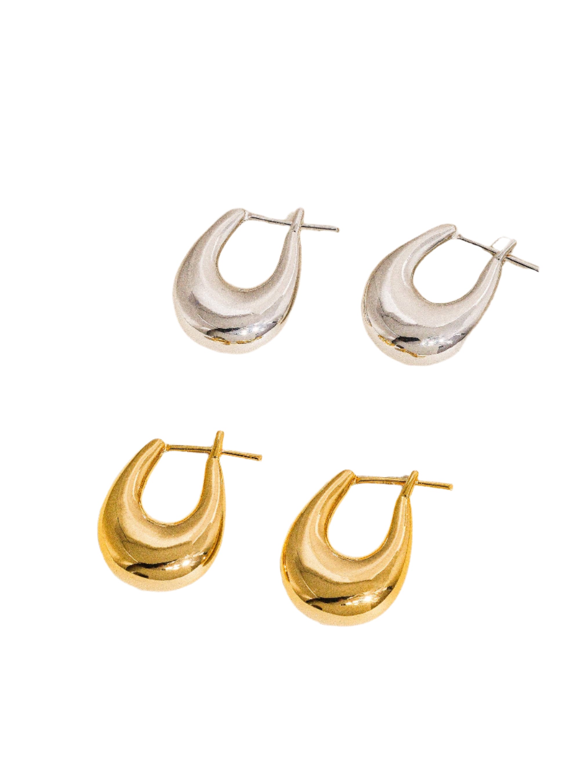 Gold droplet hoop earrings with a gently curved silhouette and smooth, polished finish. Crafted from 18K gold-plated brass, measuring 1 x 0.7 inches. Hypoallergenic, water- and tarnish-resistant—ideal for effortless everyday elegance.