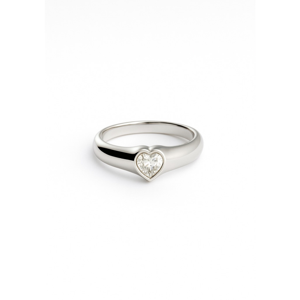 Classic signet ring crafted from 18K gold-plated stainless steel, featuring a heart-shaped face adorned with a sparkling central zirconia stone. Hypoallergenic, water- and tarnish-resistant—perfect for showcasing timeless elegance and a touch of romance.