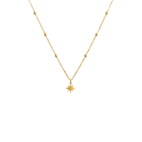 Gold necklace with a star pendant on a white background