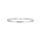 An 18K gold-plated stainless steel bracelet with minimalist design and small embellishments on the surface.