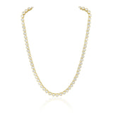 Elegant tennis necklace featuring a continuous line of sparkling cubic zirconia stones set in 18K gold-plated stainless steel. Designed for timeless sparkle with a modern edge, this hypoallergenic, water- and tarnish-resistant piece is perfect worn solo or layered for added glamour.