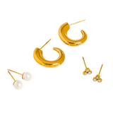 Maison Ella Harper earring set featuring gold-plated hoops, pearl studs, and triple CZ stone studs on white background