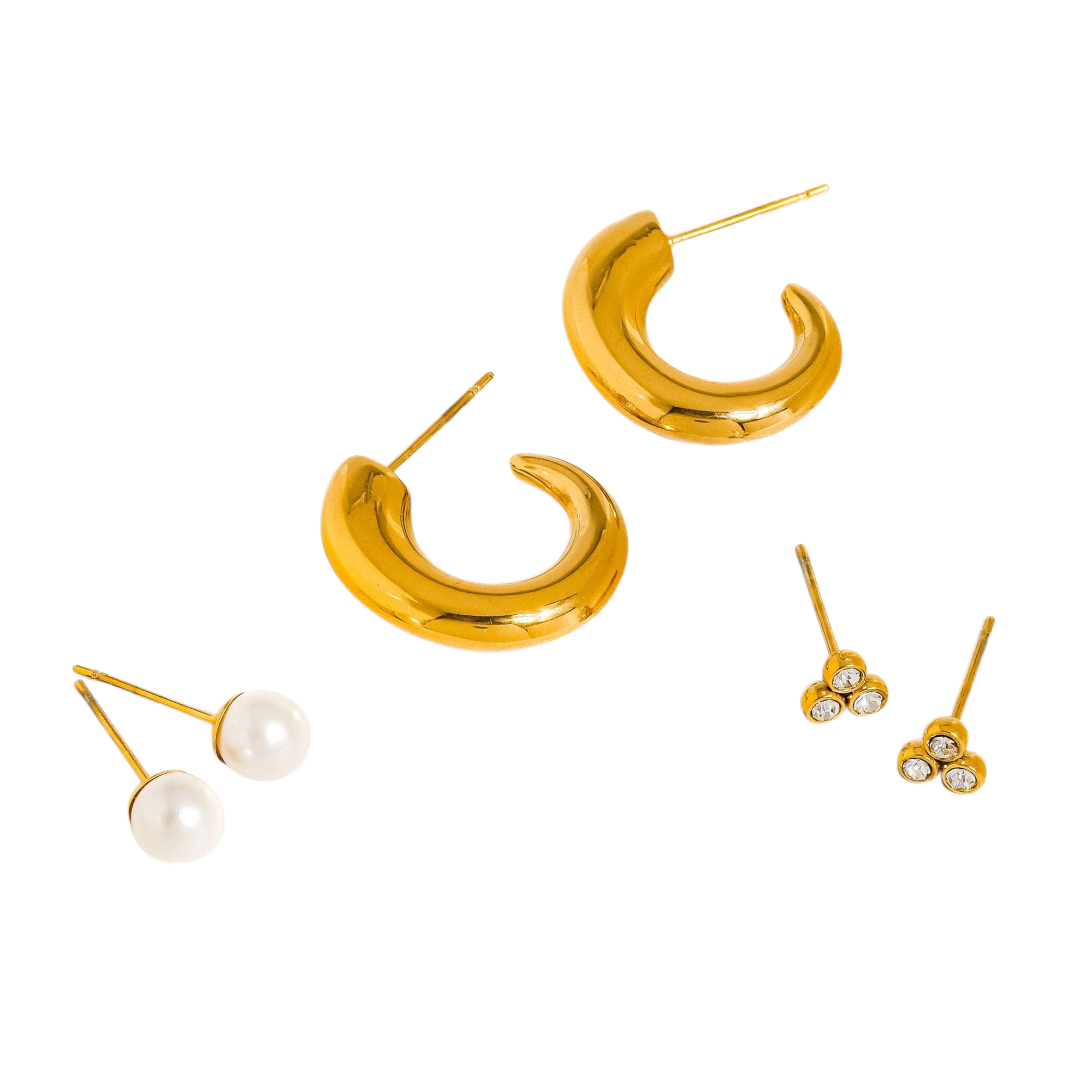 Maison Ella Harper earring set featuring gold-plated hoops, pearl studs, and triple CZ stone studs on white background