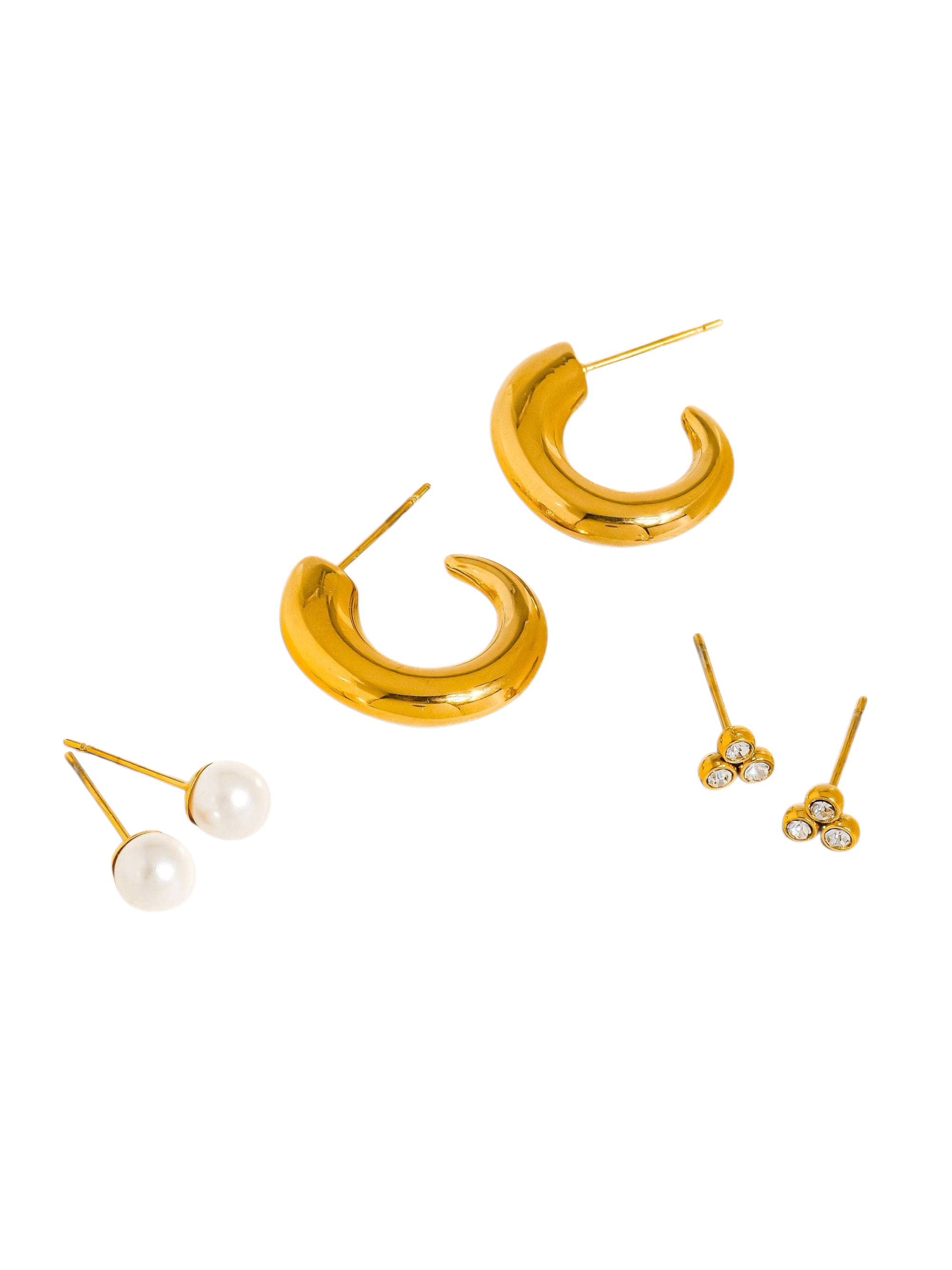 Maison Ella Harper earring set featuring gold-plated hoops, pearl studs, and triple CZ stone studs on white background