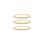 Gold cubic zirconia eternity band ring, worn