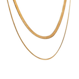 Maison Ella Olivia layered gold snake chain necklace featuring two sleek, 18K gold-plated chains.